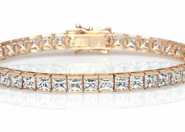 Princess Cut tennis bracelet with 18.72 carats* of diamond simulants in 10 carat yellow gold