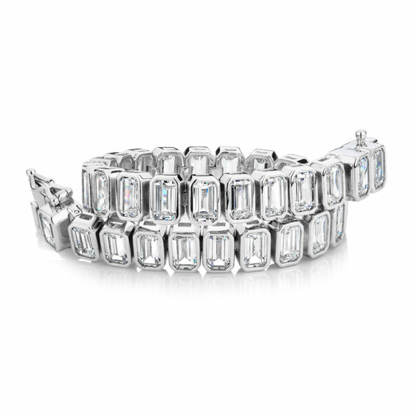 Emerald Cut tennis bracelet with 29.04 carats* of diamond simulants in sterling silver