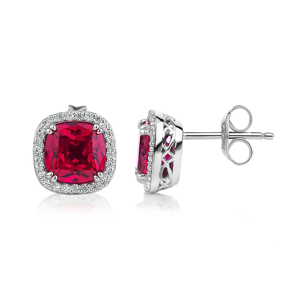 Cushion and Round Brilliant halo stud earrings with ruby simulants and 0.25 carats* of diamond simulants in sterling silver - Image 2