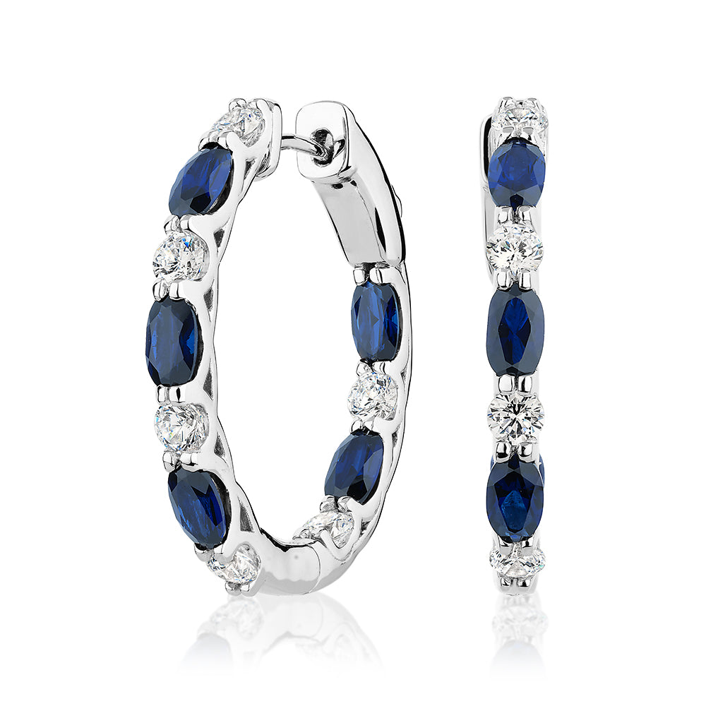 Round Brilliant and Oval hoop earrings with sapphire simulants and 1.32 carats* of diamond simulants