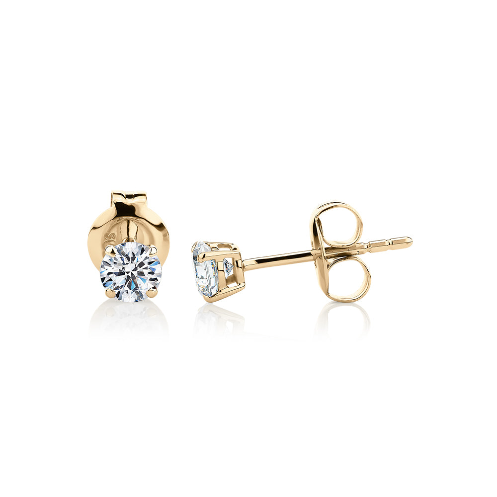 Round Brilliant stud earrings with 0.5 carats* of diamond simulants in 10 carat yellow gold - Image 2