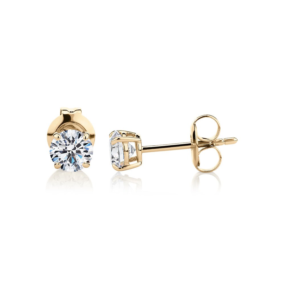 Round Brilliant stud earrings with 0.75 carats* of diamond simulants in 10 carat yellow gold - Image 2