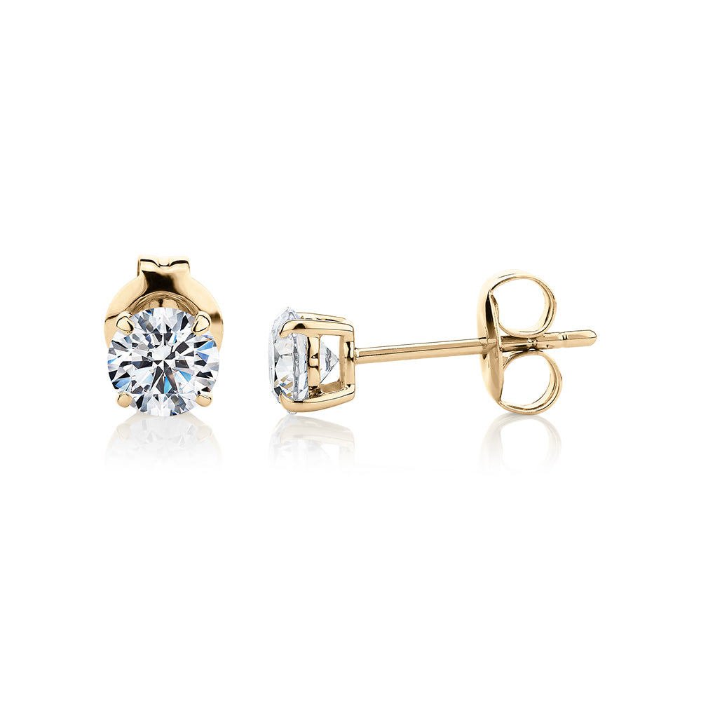 Round Brilliant stud earrings with 1 carat* of diamond simulants in 10 carat yellow gold - Image 2