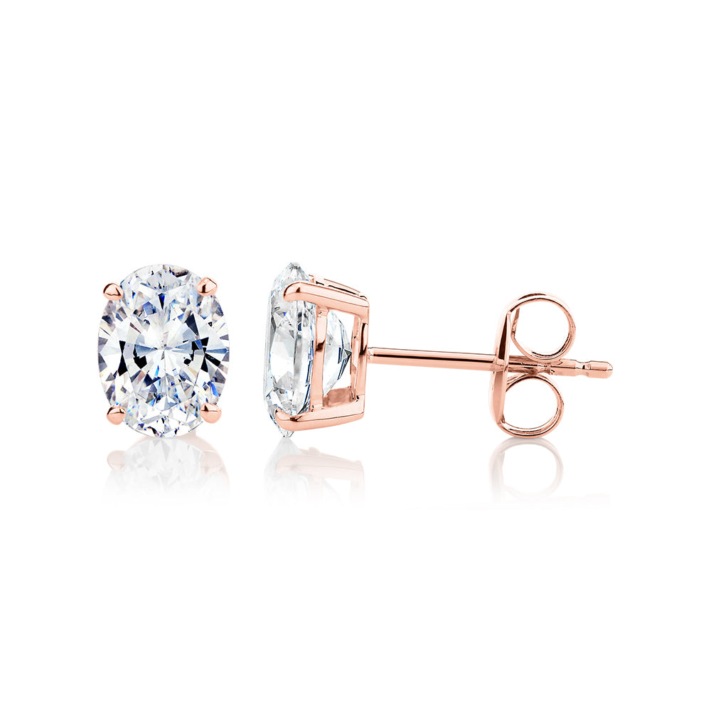 Oval stud earrings with 2 carats* of diamond simulants in 10 carat rose gold - Image 2