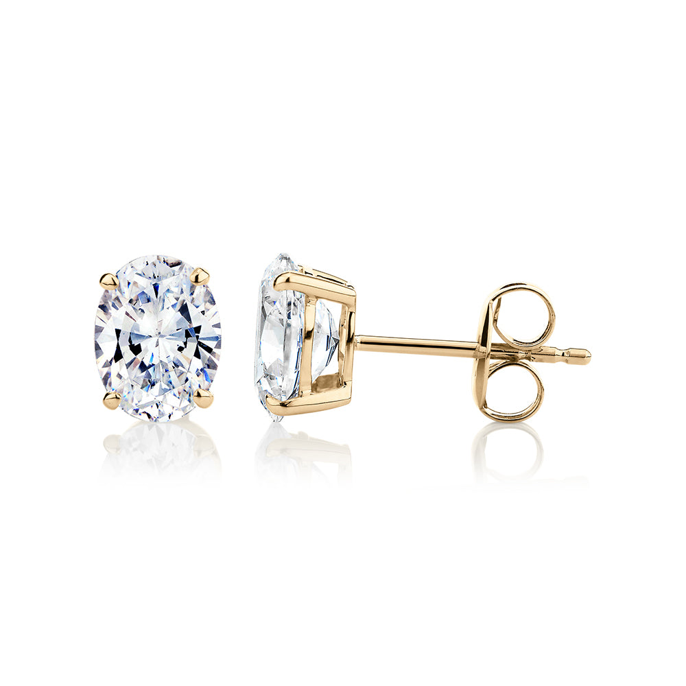 Oval stud earrings with 2 carats* of diamond simulants in 10 carat yellow gold - Image 2