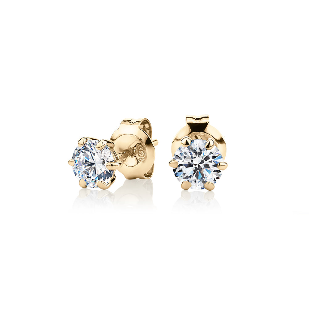 Round Brilliant stud earrings with 1 carat* of diamond simulants in 10 carat yellow gold