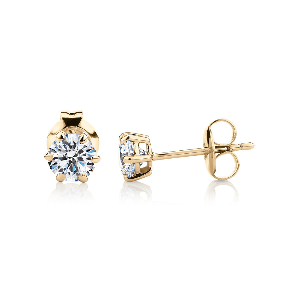 Round Brilliant stud earrings with 1 carat* of diamond simulants in 10 carat yellow gold - Image 2