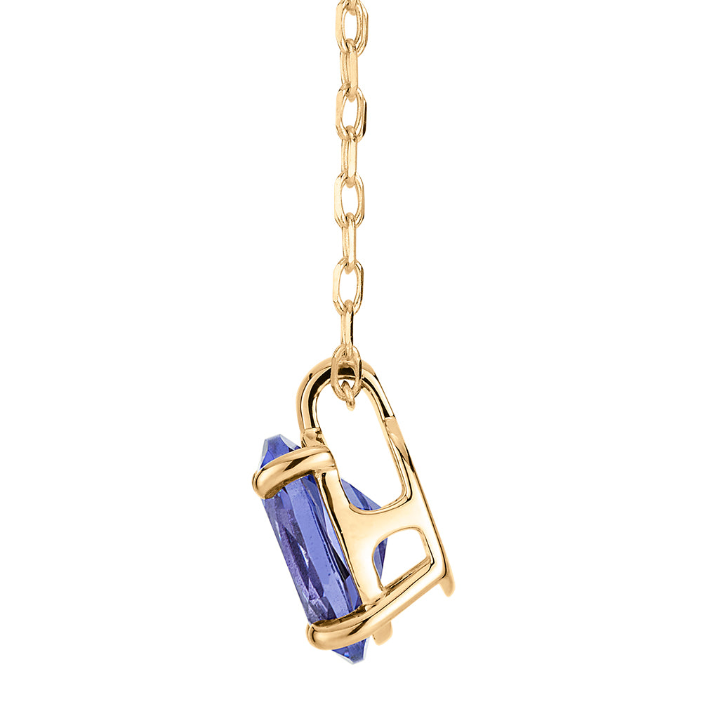 Oval solitaire pendant with tanzanite simulant in 10 carat yellow gold - Image 2