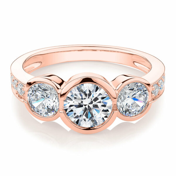 Three stone ring with 2.11 carats* of diamond simulants in 10 carat rose gold
