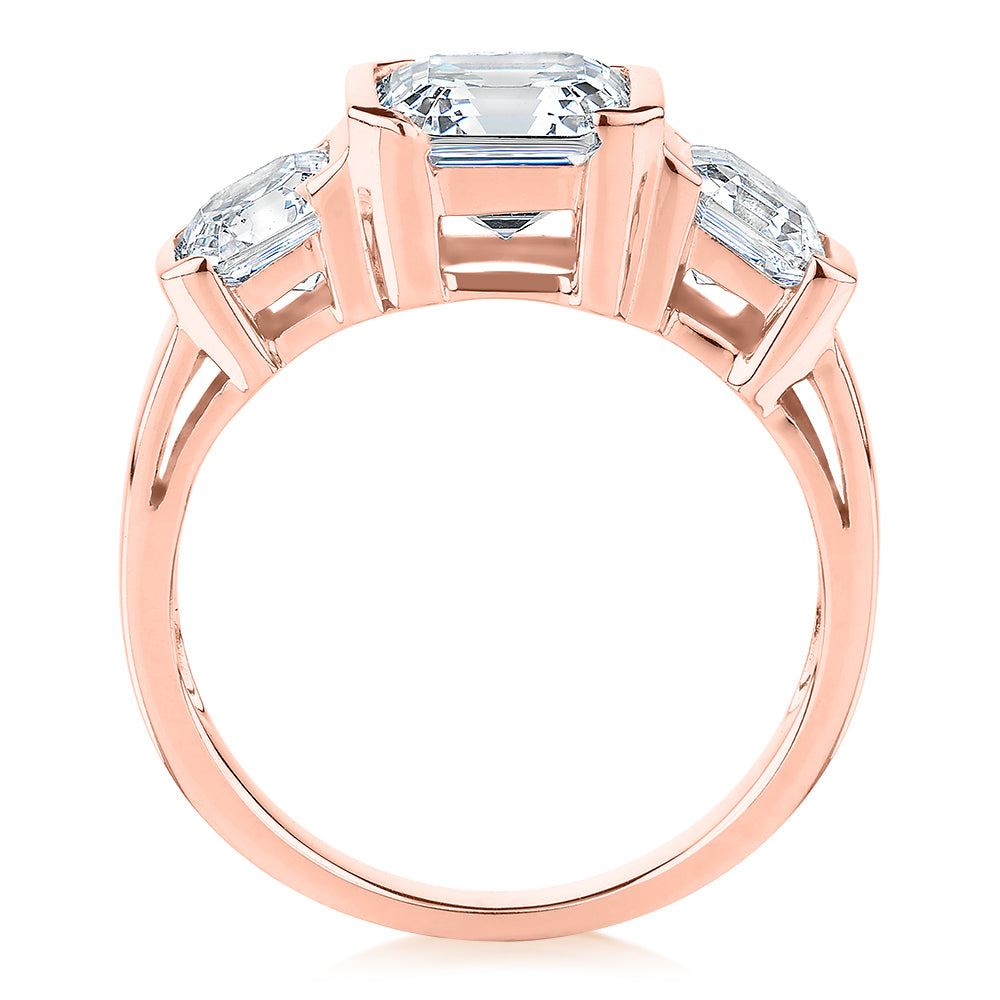 Three stone ring with 3.38 carats* of diamond simulants in 10 carat rose gold - Image 3