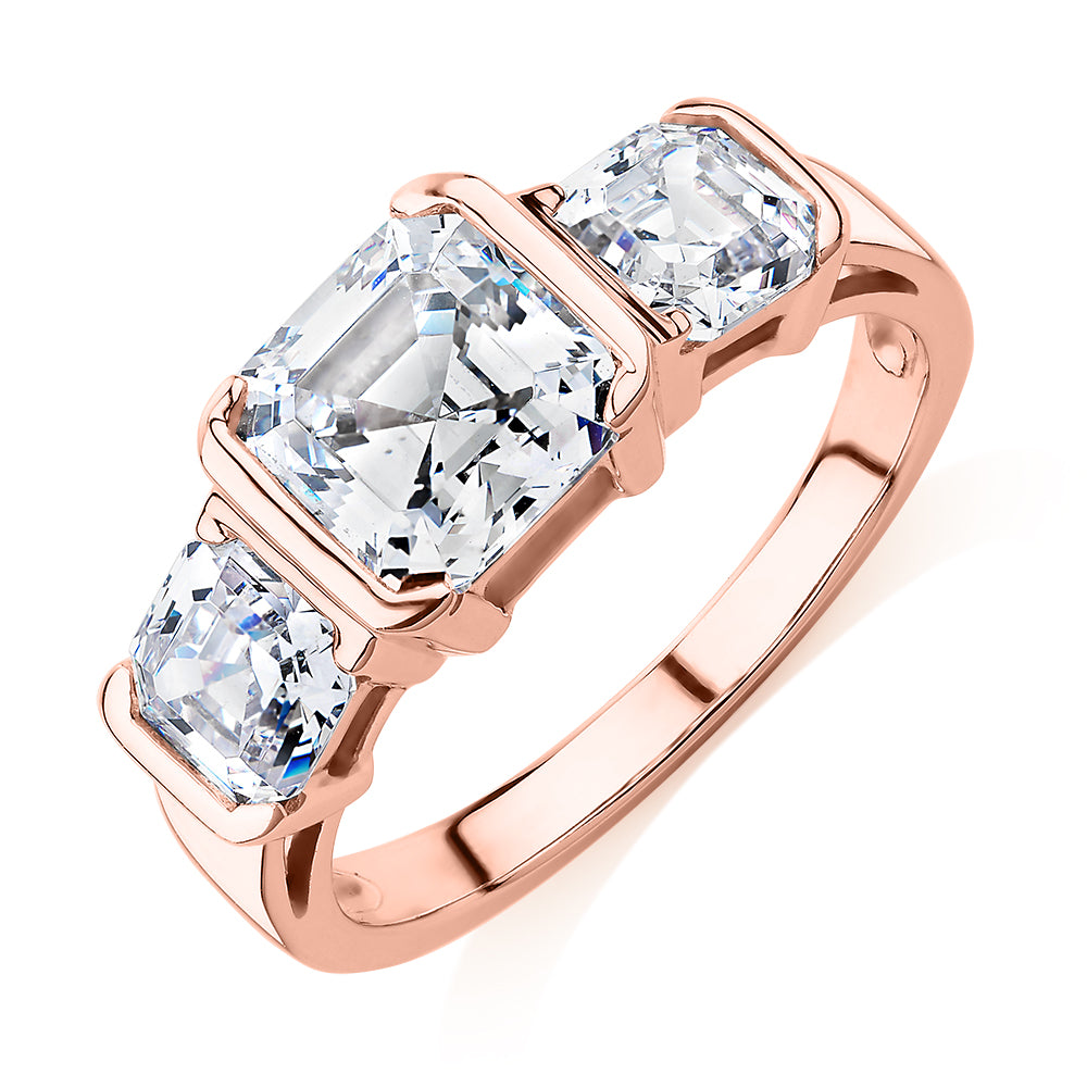 Three stone ring with 3.38 carats* of diamond simulants in 10 carat rose gold - Image 4
