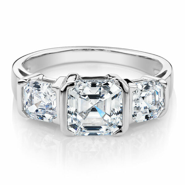 Three stone ring with 3.38 carats* of diamond simulants in 10 carat white gold