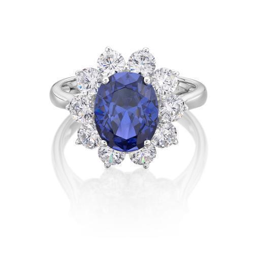 Dress ring with 10x8mm tanzanite simulant and 1.7 carats* of diamond simulants in 10 carat white gold