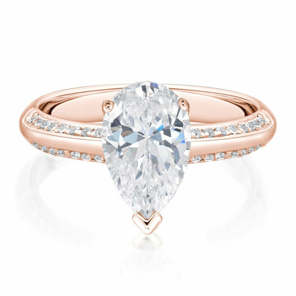 Pear and Round Brilliant shouldered engagement ring with 2 carats* of diamond simulants in 14 carat rose gold