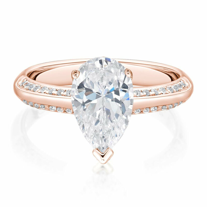 Pear and Round Brilliant shouldered engagement ring with 2 carats* of diamond simulants in 14 carat rose gold