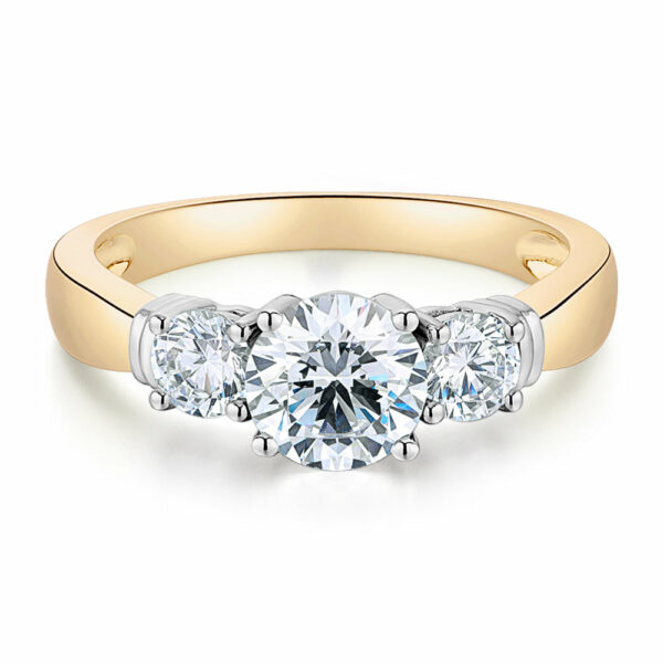 Three stone ring with 1.53 carats* of diamond simulants in 14 carat yellow and white gold