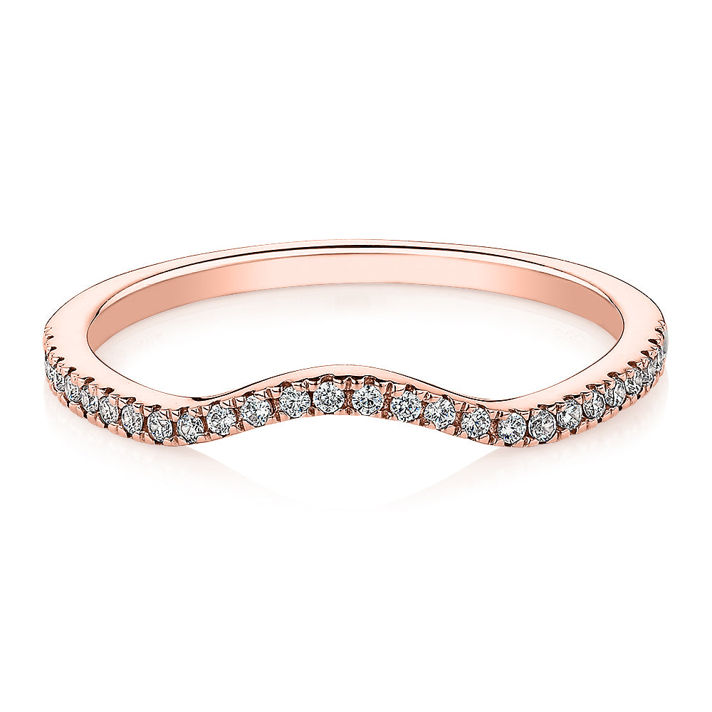 Curved wedding or eternity band in 14 carat rose gold
