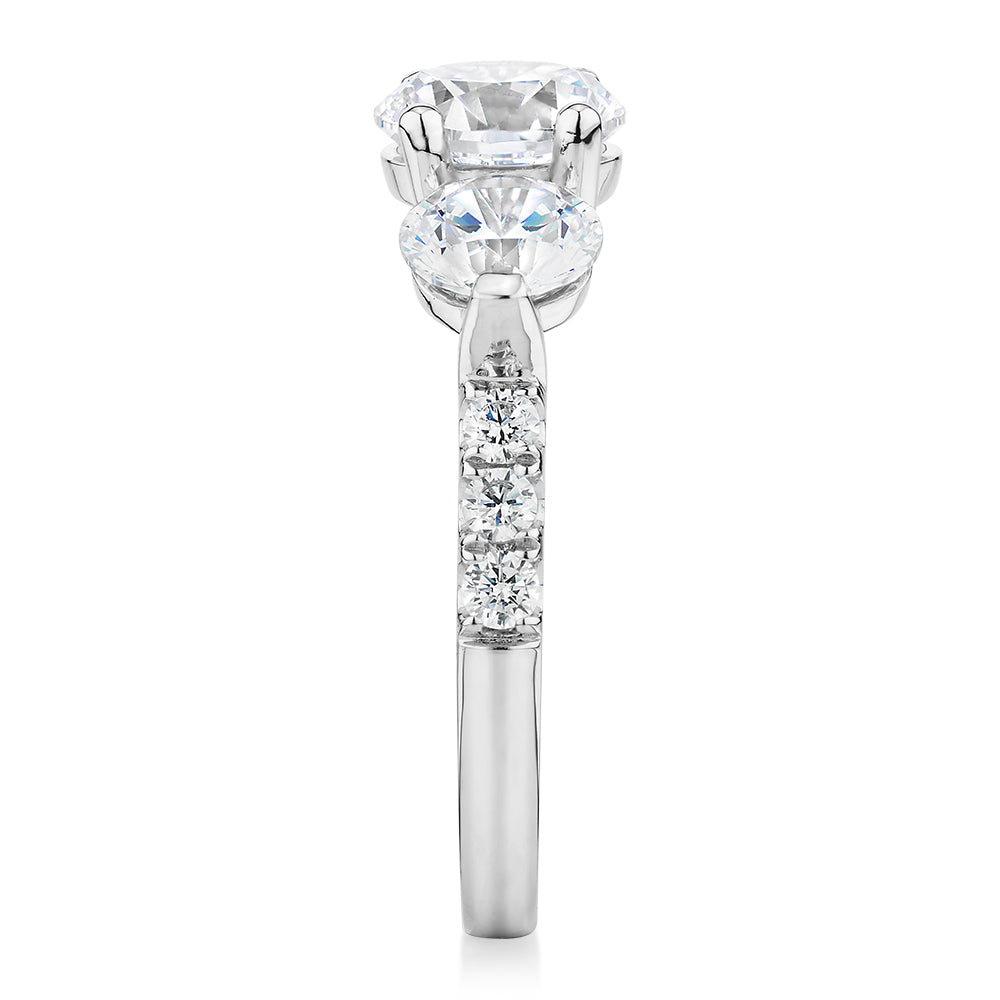 Three stone ring with 3.59 carats* of diamond simulants in 10 carat white gold - Image 2