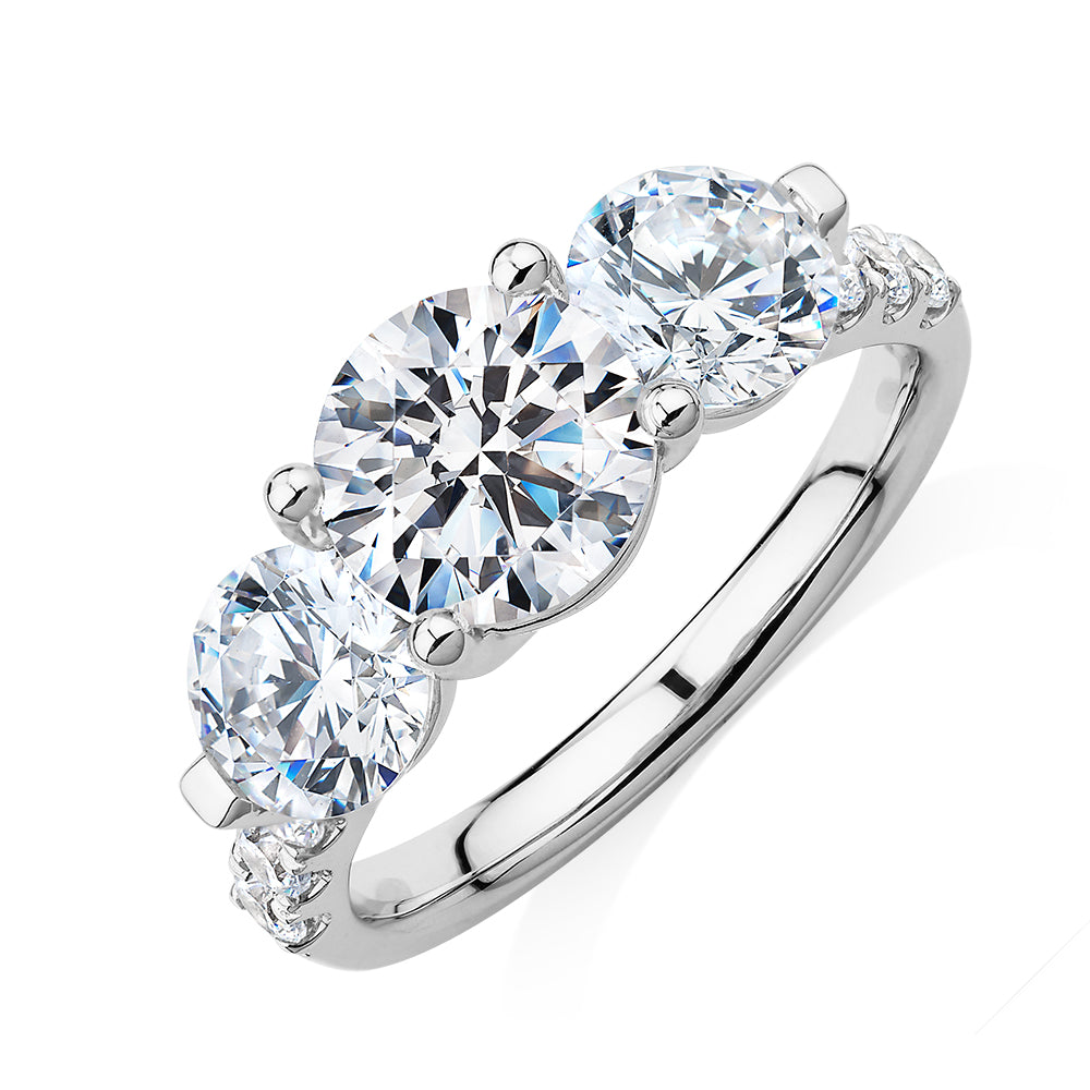 Three stone ring with 3.59 carats* of diamond simulants in 10 carat white gold - Image 4