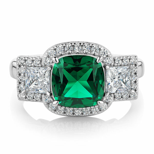 Dress ring with emerald simulant and 0.99 carats* of diamond simulants in sterling silver