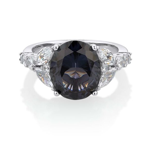 Dress ring with dark blue sapphire simulant and 1.45 carats* of diamond simulants in sterling silver